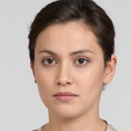 Neutral white young-adult female with short  brown hair and brown eyes