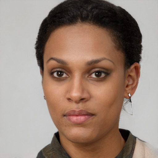 Neutral black young-adult female with short  black hair and brown eyes