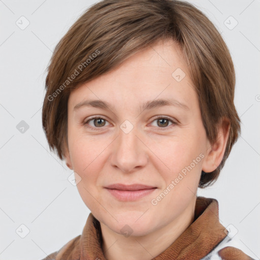 Joyful white young-adult female with medium  brown hair and grey eyes