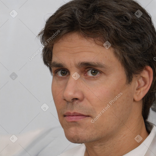 Neutral white adult male with short  brown hair and brown eyes