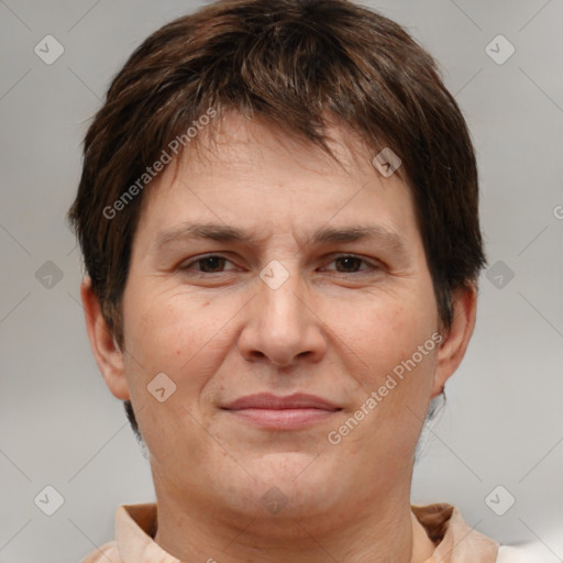 Joyful white adult female with short  brown hair and brown eyes