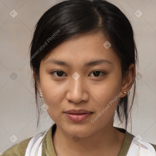 Joyful asian young-adult female with medium  brown hair and brown eyes