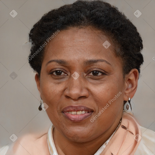 Joyful latino adult female with short  brown hair and brown eyes