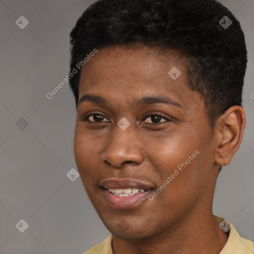 Joyful black young-adult male with short  black hair and brown eyes