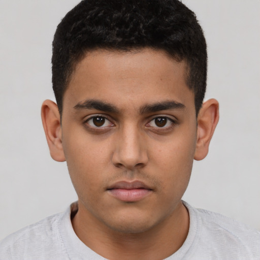 Neutral latino young-adult male with short  brown hair and brown eyes