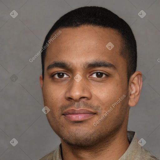 Joyful latino young-adult male with short  brown hair and brown eyes