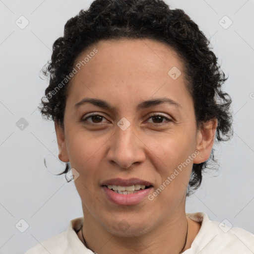 Joyful white adult female with short  brown hair and brown eyes