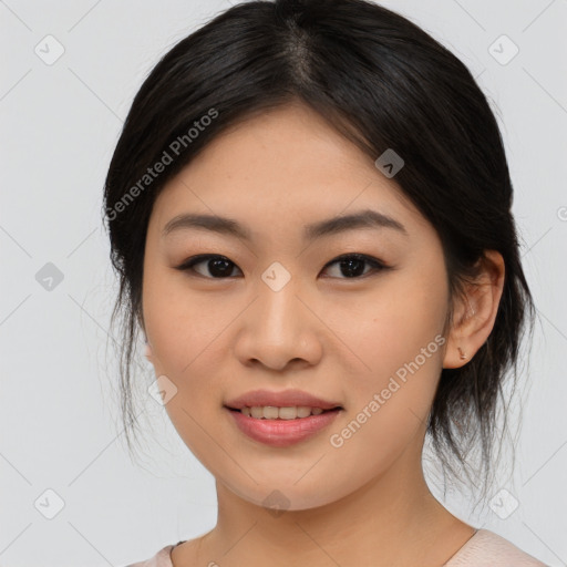 Joyful asian young-adult female with medium  black hair and brown eyes