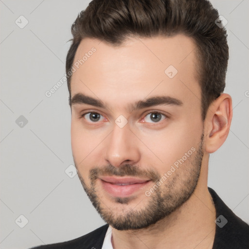 Neutral white young-adult male with short  brown hair and brown eyes