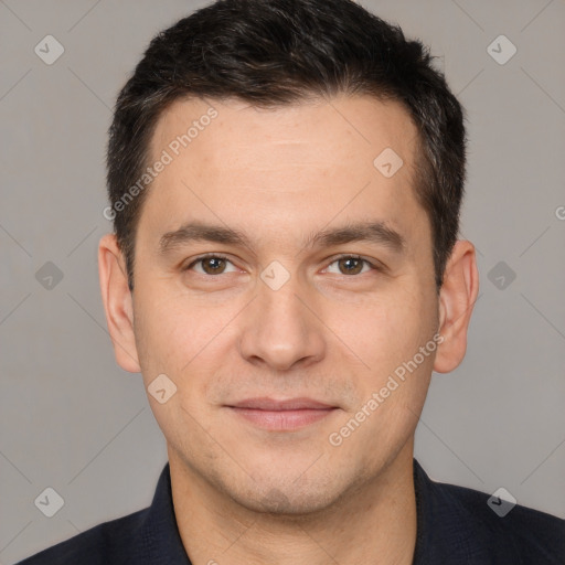 Joyful white adult male with short  brown hair and brown eyes