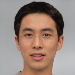 Neutral asian young-adult male with short  brown hair and brown eyes