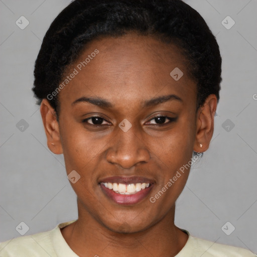 Joyful black young-adult female with short  black hair and brown eyes