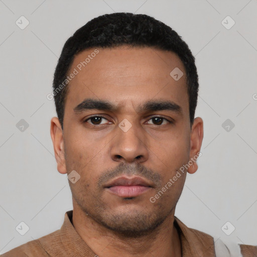 Neutral latino young-adult male with short  black hair and brown eyes