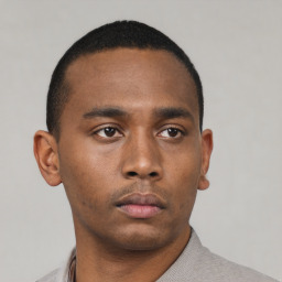 Neutral black young-adult male with short  black hair and brown eyes