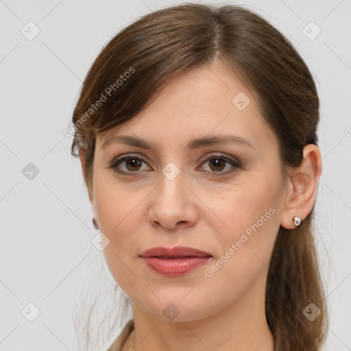 Joyful white young-adult female with long  brown hair and grey eyes