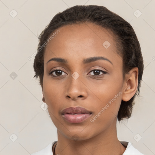 Neutral latino young-adult female with medium  brown hair and brown eyes