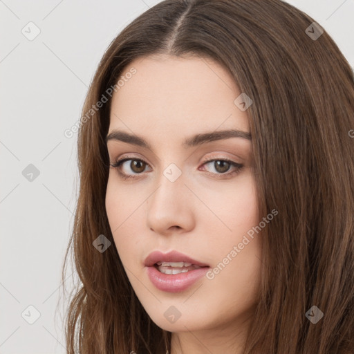 Neutral white young-adult female with long  brown hair and brown eyes