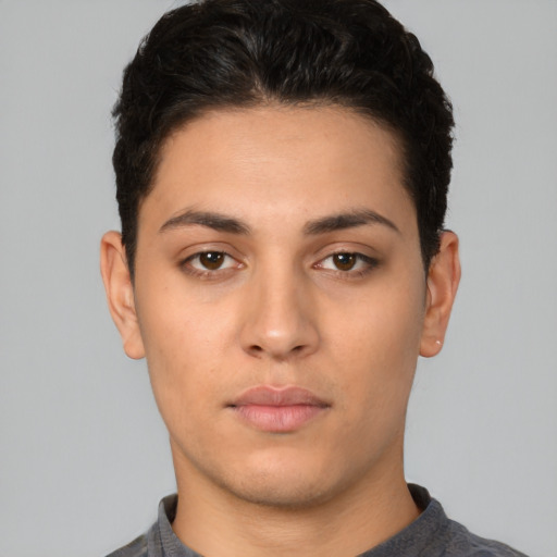 Neutral white young-adult male with short  brown hair and brown eyes