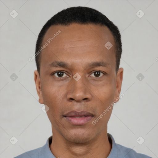 Neutral black adult male with short  black hair and brown eyes