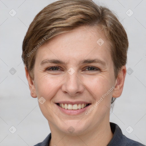 Joyful white young-adult female with short  brown hair and grey eyes