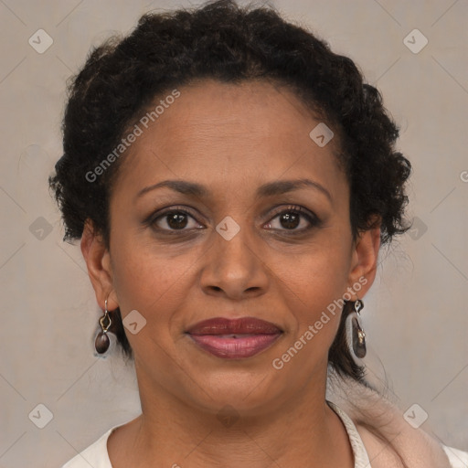 Joyful black adult female with short  brown hair and brown eyes