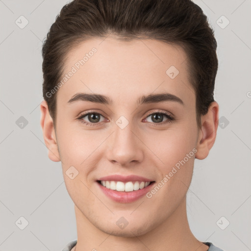 Joyful white young-adult female with short  brown hair and brown eyes