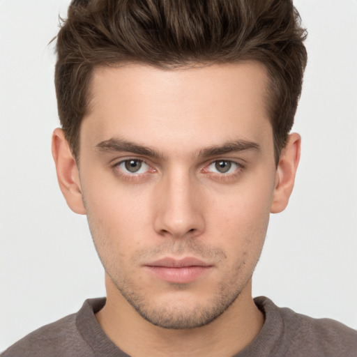 Neutral white young-adult male with short  brown hair and brown eyes