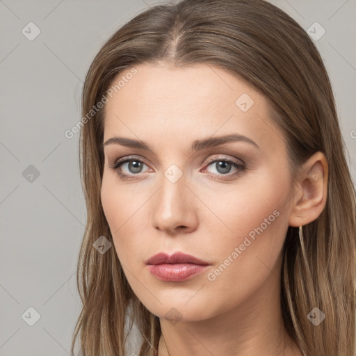 Neutral white young-adult female with long  brown hair and brown eyes