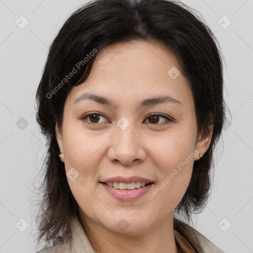 Joyful white young-adult female with medium  brown hair and brown eyes