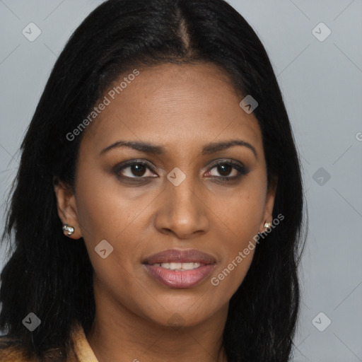 Joyful black young-adult female with long  brown hair and brown eyes