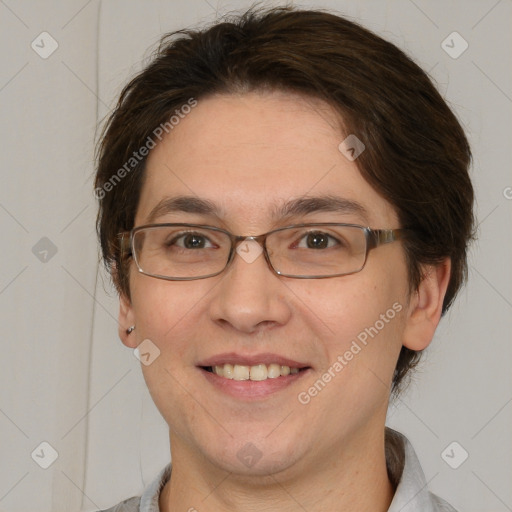 Joyful white adult female with short  brown hair and brown eyes