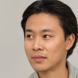 Neutral asian young-adult male with short  black hair and brown eyes