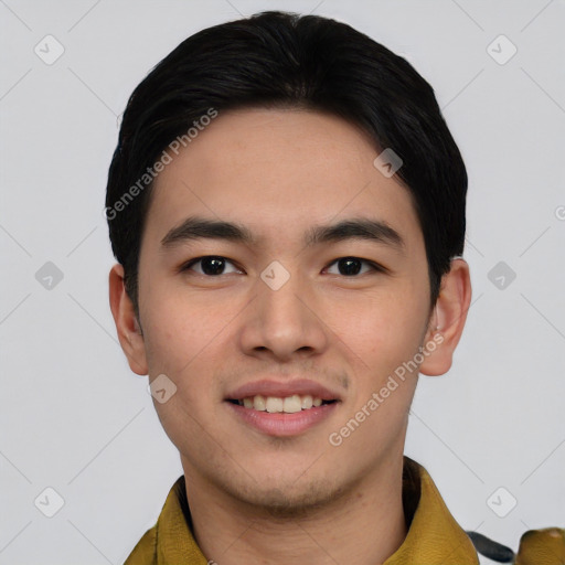 Joyful asian young-adult male with short  black hair and brown eyes