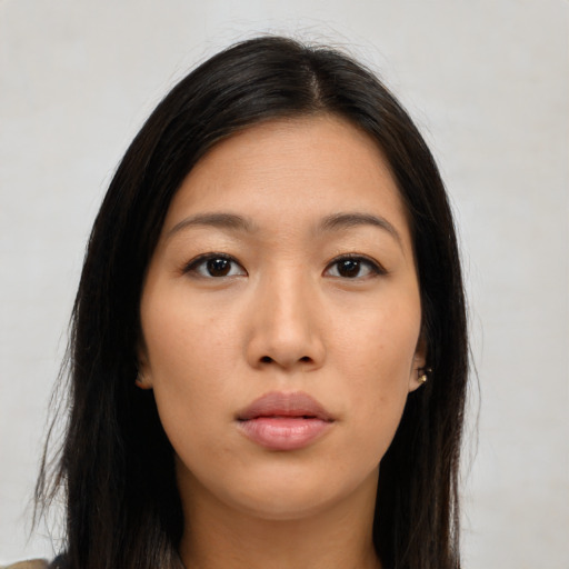 Neutral asian young-adult female with long  brown hair and brown eyes