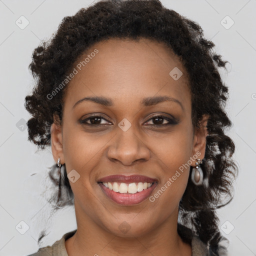 Joyful black young-adult female with medium  brown hair and brown eyes