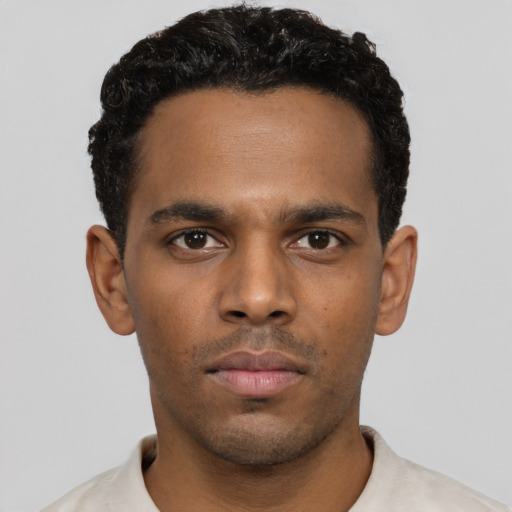 Neutral black young-adult male with short  black hair and brown eyes
