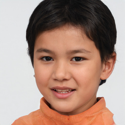 Joyful white child female with short  brown hair and brown eyes