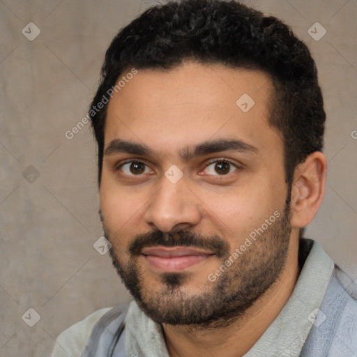 Joyful white young-adult male with short  black hair and brown eyes