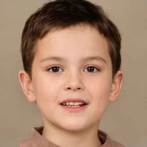 Joyful white child male with short  brown hair and brown eyes