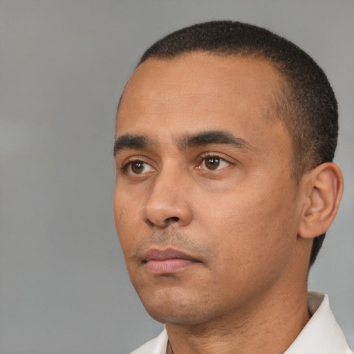 Neutral white young-adult male with short  black hair and brown eyes