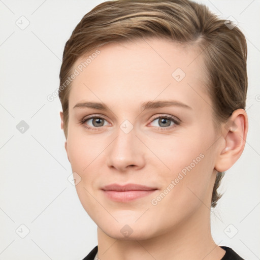 Joyful white young-adult female with short  brown hair and grey eyes