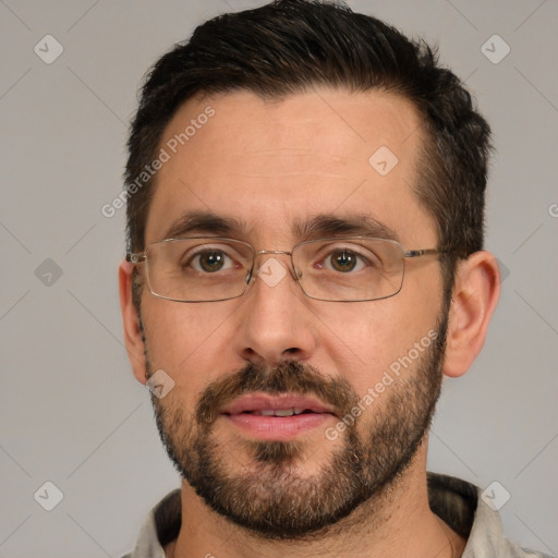 Joyful white adult male with short  brown hair and brown eyes