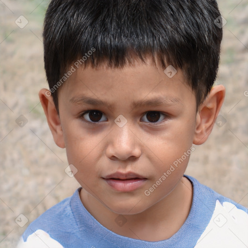 Joyful white child male with short  brown hair and brown eyes