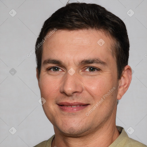 Joyful white young-adult male with short  brown hair and brown eyes