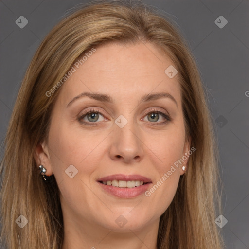 Joyful white adult female with long  brown hair and brown eyes