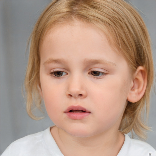 Neutral white child female with medium  brown hair and blue eyes