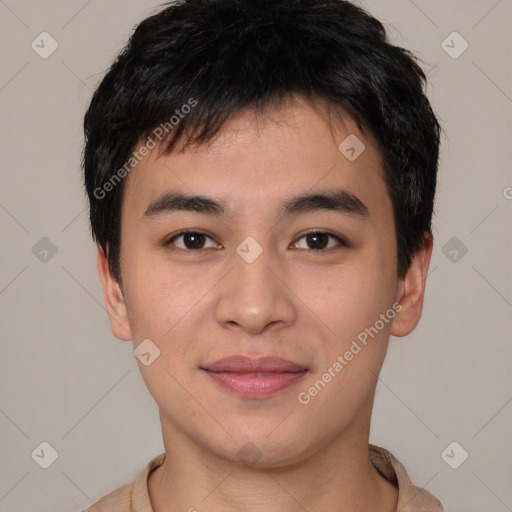 Joyful asian young-adult male with short  black hair and brown eyes