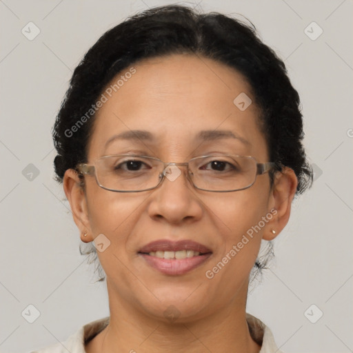 Joyful latino adult female with short  brown hair and brown eyes