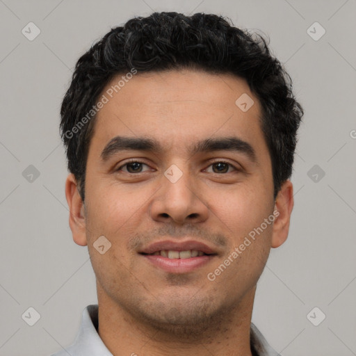 Joyful white young-adult male with short  black hair and brown eyes