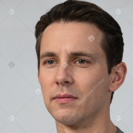 Neutral white adult male with short  brown hair and brown eyes